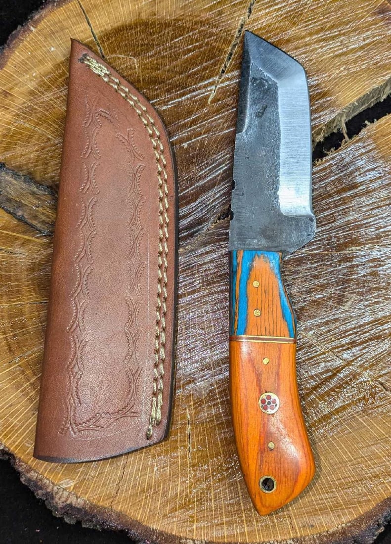 MHS Cutlery Steel Knife And Leather Sheath RTCDD: MHS Cutlery Steel Knife And Leather Sheath RTCDD. Steel knife comes in a leather sheath. Is approx 2 1/4" x 3/4" x 9" and it weighs 0.44b. The knife does not appear to have been used and has a co