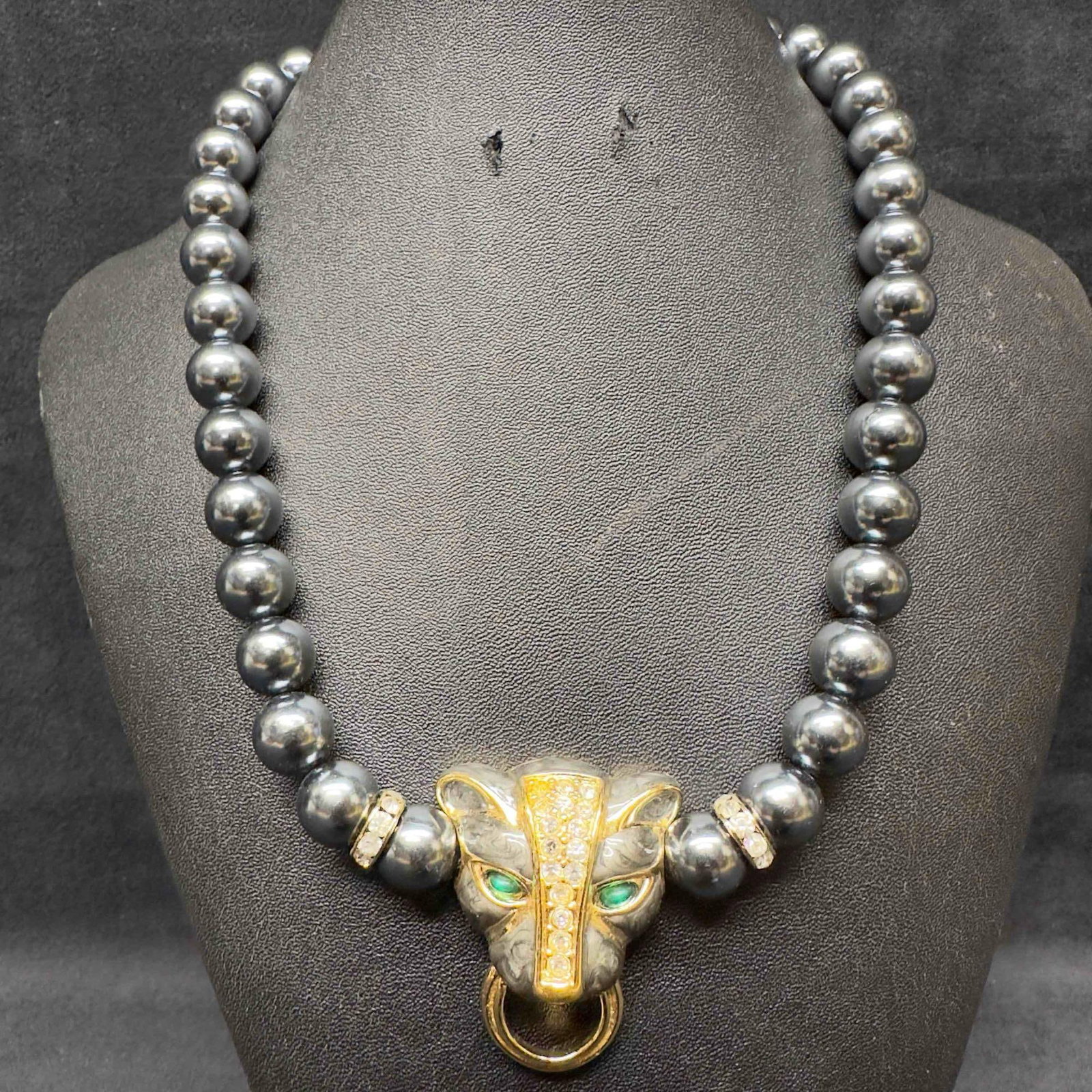 KJL Kenneth Lane Avon Duchess of Windsor Green Eyes Panther Faux Gray Pearls Beaded Necklace: KJL Kenneth Lane Avon Duchess of Windsor Green Eyes Panther Faux Gray Pearls Beaded Necklace. The necklace features gray acrylic with crystal accents, gold tone plated metal, and the faux gray pearls.