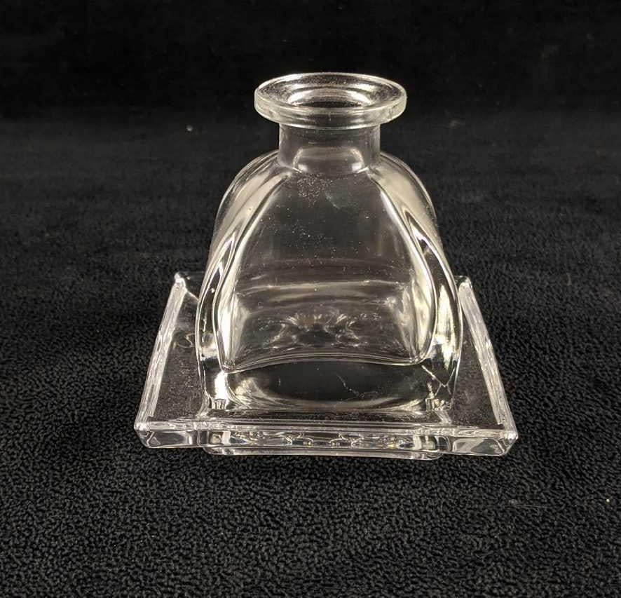 Small Fragrance Holder: Small Fragrance Holder This fragrance holder comes with its own little stand tray. You can fill it up with your favorite essential oil or make it into a new decoration of your own. 2 1/2in tall 3in a
