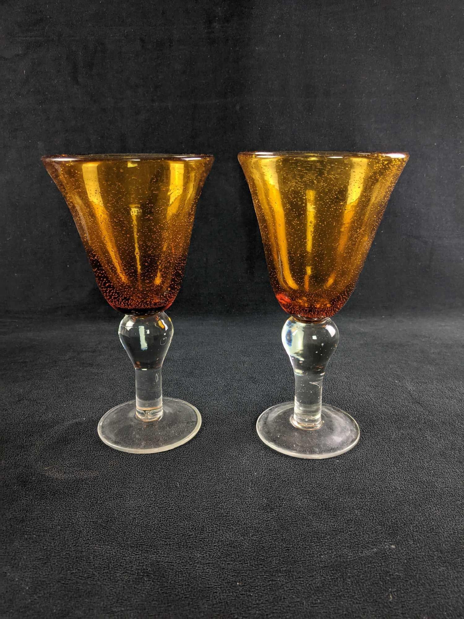Decorative Glass Gantlets Orange: Decorative Glass Cups Orange These decorative cups are great for table centerpieces. You can decorate and put things inside the cups such as pebbles or candles. These are in good condition with no kno