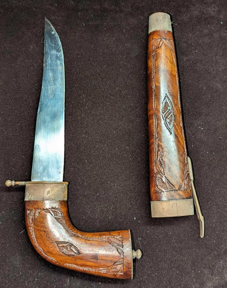 Vintage Wood Sheath Carved Pistol Shaped Knife: Vintage Wood Sheath Carved Pistol Shaped Knife. This is approx 5" x 1/2" x 11" and it weighs 0.58lb. Made in India. The knife is in a good, vintage condition with some wear on the wood and metal. Plea