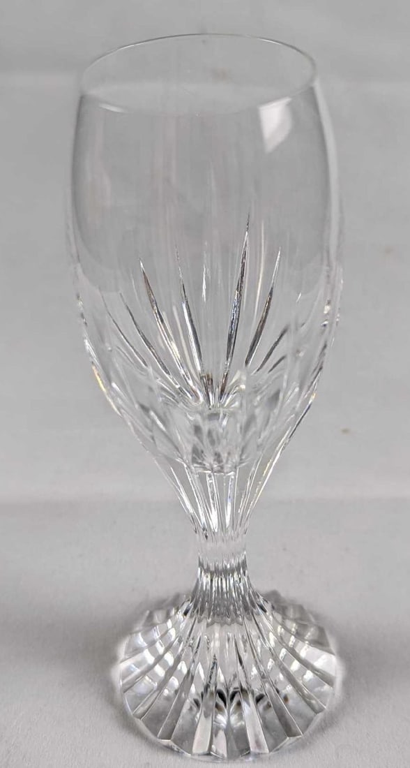 Baccarat Crystal Massena Liqueur Cordial Glass: The Massena glass showcases Baccarat’s meticulous craftsmanship. Deep orgue bevel cuts are etched directly into the clear crystal, radiating from the foot of the glass to the base of the wide bowl. 