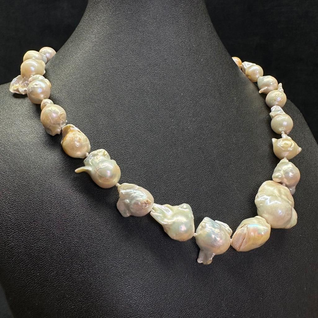 Very Large Baroque Pearl Necklace: This piece of jewelry has been tested and researched prior to listing. Please view all our pictures they are part of our description. DETAILS: Metal - Base Metal Color - Silver Stones - Pearl Hallmark