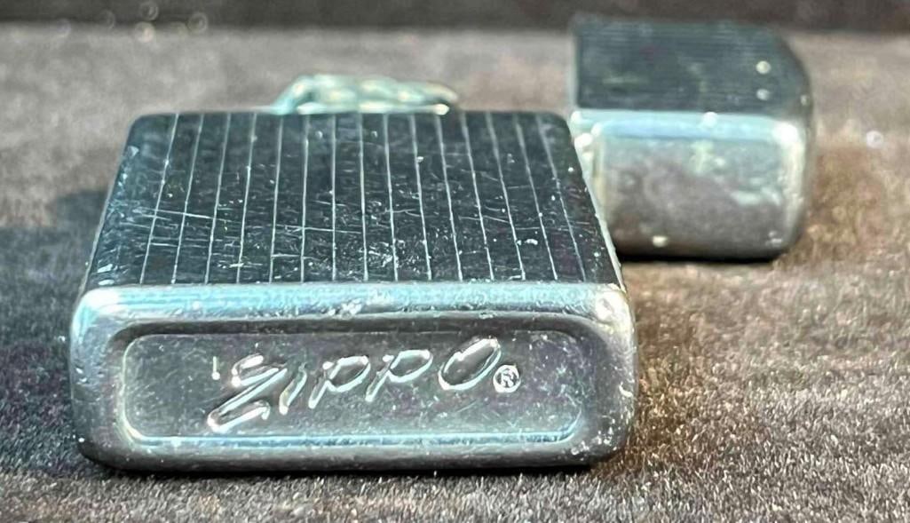 Vintage Zippo Lighter: Vintage Zippo Lighter. This lot contains a Vintage Zippo Lighter. It is approx 1 1/4" x 1/4" x 2 1/4" and it weighs about 0.08lbs. Overall the Zippo Lighter is in good used condition with some li