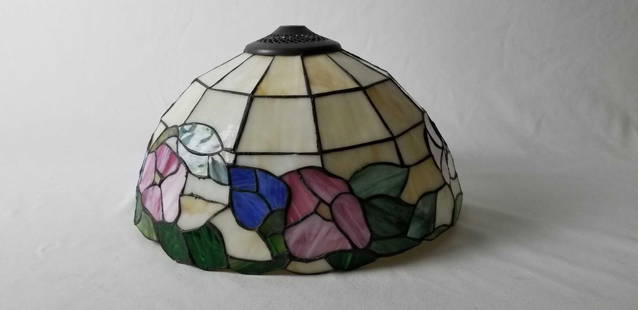 Vintage Floral Stained Glass Lamp Shade: Vintage Floral Stained Glass Lamp Shade by unknown maker and date is not known. The egg shell white is compliments by pink and blue flora and green trim. It is in fair condition, will need repair. App