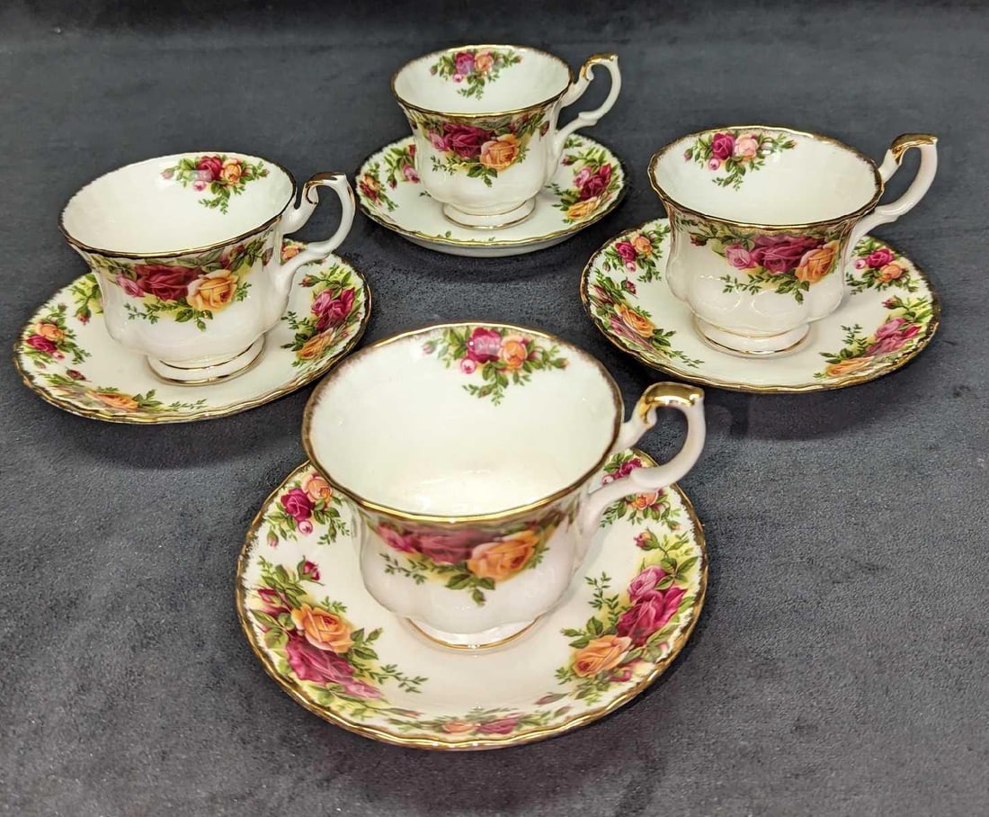 4 Royal Albert Old Country Roses Cups & Saucers C: 4 Royal Albert Old Country Roses Cups & Saucers C. Each cup is approx 4" x 3" x 2 7/8" and each saucer is approx 5 1/2" x 5 1/2" x 1". The total weight is 2.38 lbs. All are made of bone china. There a