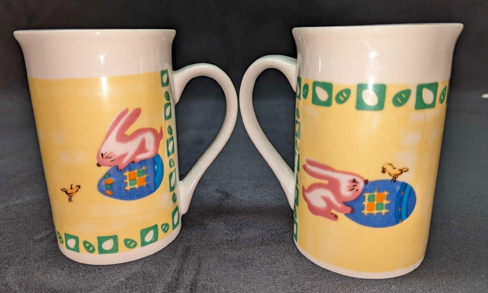 2 Royal Norfolk Easter Bunny Ceramic Mugs: 2 Royal Norfolk Easter Bunny Ceramic Mugs. Each mug is approx 4 1/2" x 3 1/4" x 4 3/4" and the total weight is 1.75lb. The mugs have no chips or cracks.