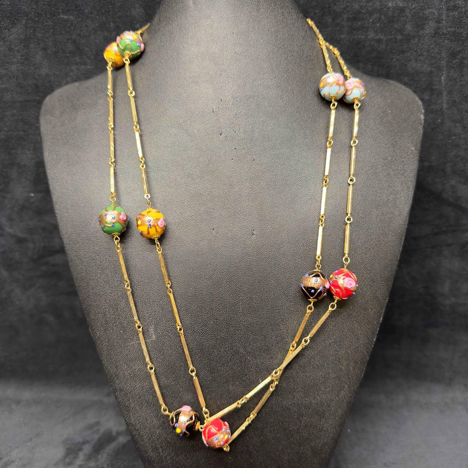 Murano Venetian Art Glass Lamp Work Multi Colored Beaded Floral Fiorato Necklace Set C22: Murano Venetian Art Glass Lamp Work Multi Colored Beaded Floral Fiorato Necklace Set C22. Necklaces with multi colored glass beads with beautiful designs on each. The necklaces feature floral accents.