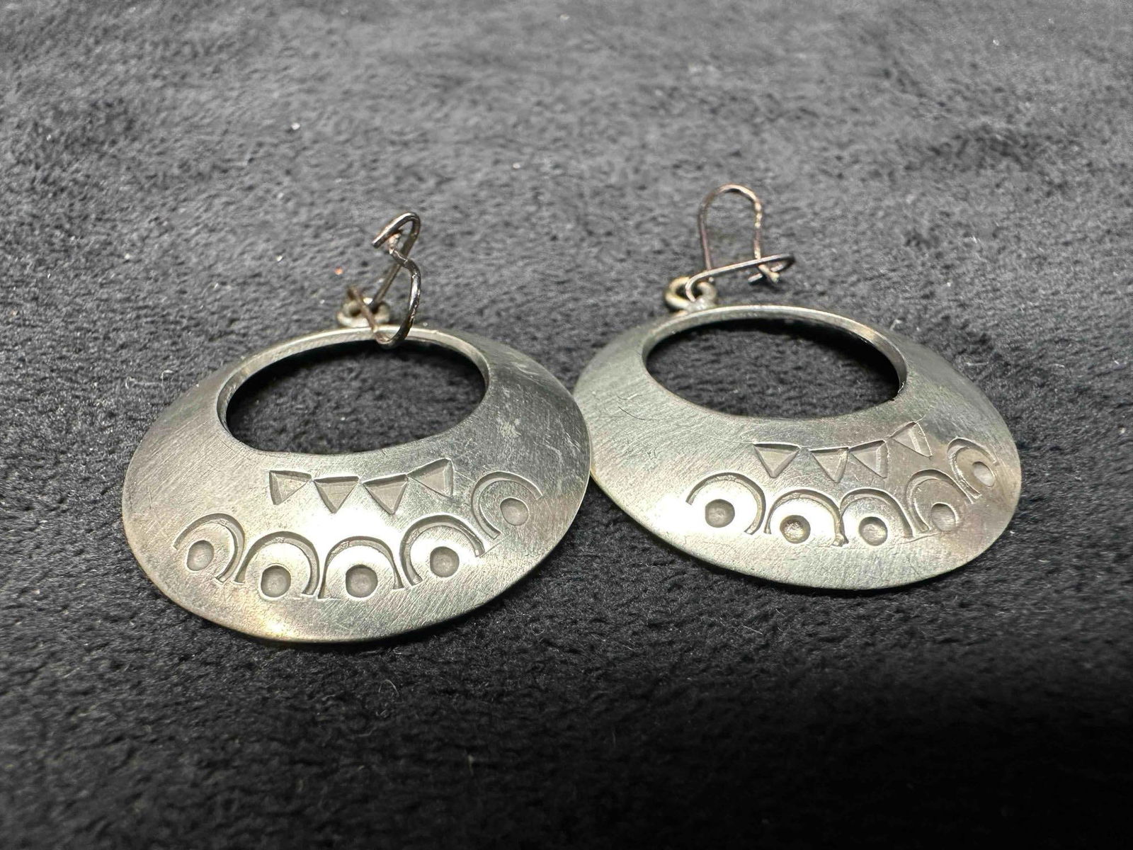 Jorgen Jensen Denmark Pewter Dangle Drop Circle Round Earrings G53: Jorgen Jensen Denmark Pewter Dangle Drop Circle Round Earrings G53. Pewter earrings with a beautiful design on each. The earrings feature a hook clasp closure. Etched Jorgen Jensen identifying marking