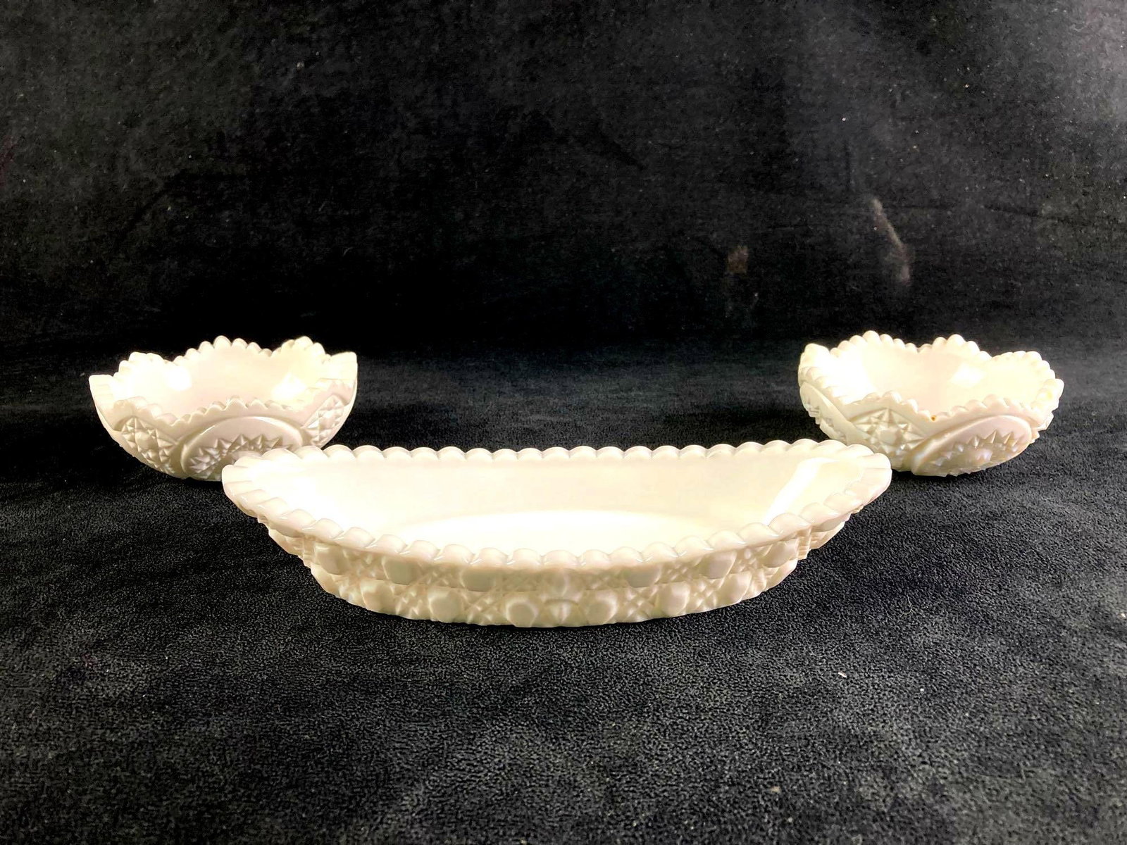 Set of (3) White Ashtrays: Up for auction is a recent estate find, a set of three white ashtrays. They are comprised of different dimensions and shapes. There are no manufacturing marks visible to identify a company. This aucti