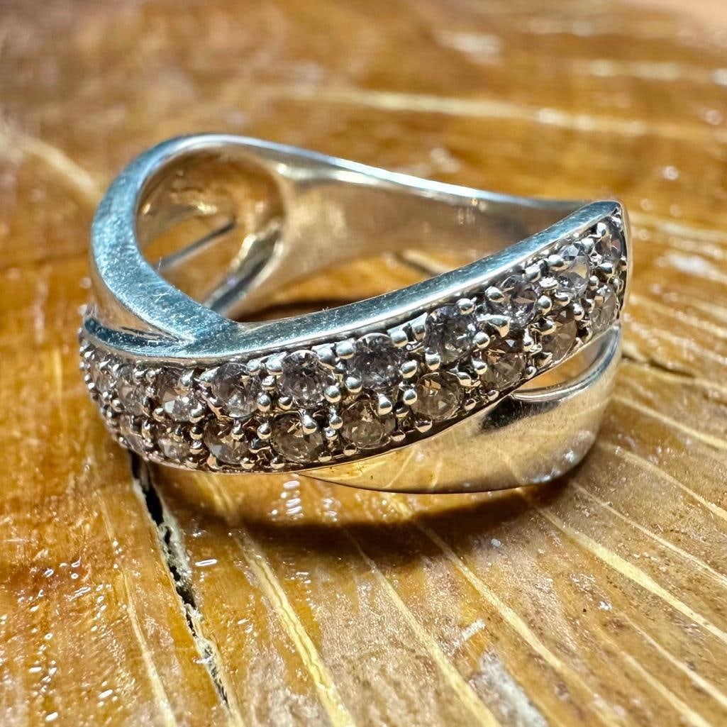 Sterling Silver CZ Ring G: This piece of jewelry has been tested and researched prior to listing. Please view all our pictures they are part of our description. DETAILS: Metal - Sterling Silver Color - Silver Stones - Cubic Zir