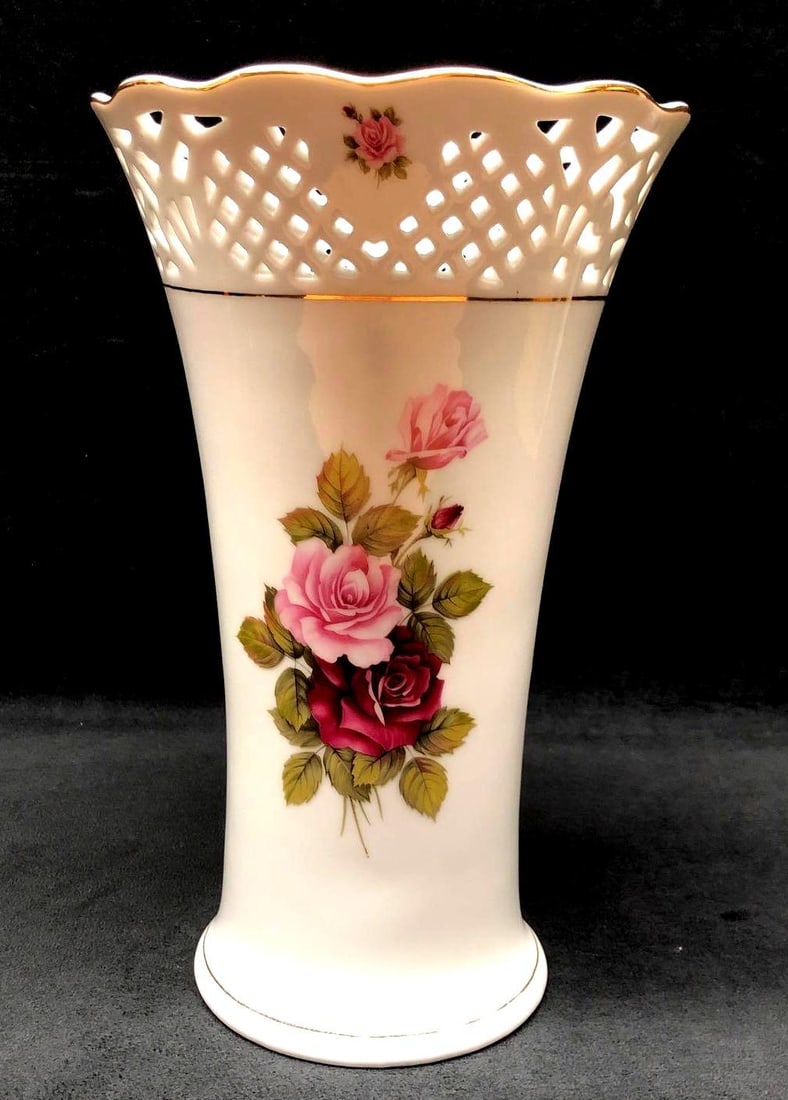 Royal Tri Ever Dipinto A Mano Italian Lattice & Wild Roses Vase: Royal Tri Ever - Dipinto A Mano - Italian Lattice and Wild Roses White Porcelain Vase. It measures 12" x 7-1/4" x 7-1/4" and it weighs 3.3lbs. The Vase is in used, vintage condition with signs of ligh