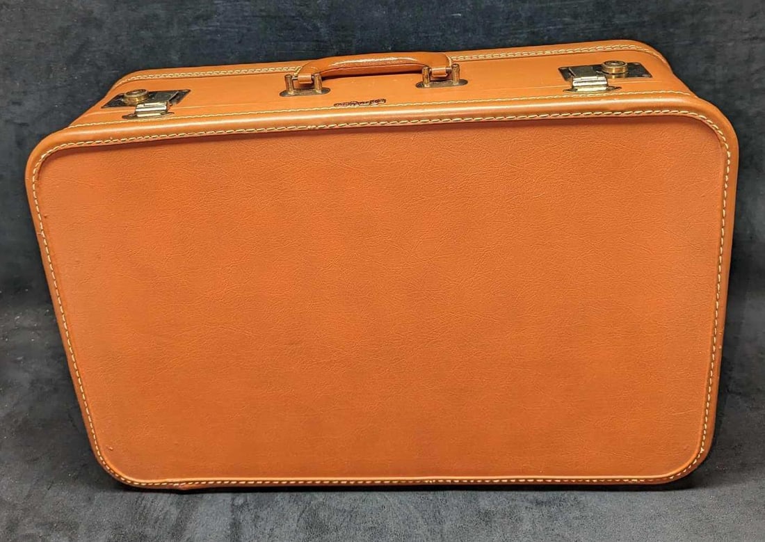 Vintage Superfortress Luggage B: Vintage Superfortress Luggage B. This is approx 21 1/4" x 6 7/8" x 14" and it weighs 6.30lbs. The handle is made of real leather, while the rest of the luggage appears to be vinyl. The brass hardware 