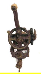 Antique McCormick Sickle Sharpener: This lot contains an antique McCormick Sickle Sharpener. It is approx BLANK and weighs about 12.2lbs. The sickle sharpener is in good used condition considering age and use. It is made of cast iron an
