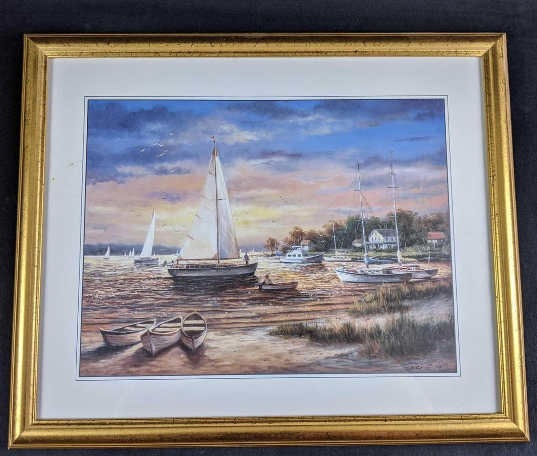 Framed Print of Sailboats at Dusk: This beautiful print is of Sailboats in the sunset. Sail away with this piece in your collection. In good condition two discoloration spots in the matte and not the print. There is one nick on the f