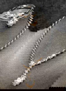 Judith Ripka Sterling Silver Black Leather Cord Necklace And Bracelet: Judith Ripka Sterling Silver Black Leather Cord Necklace And Bracelet. The necklace is approx 17" and the bracelet is approx 8". Has cubic zirconias. This has a magnetic clasp. The total weight is 69.