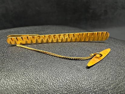 18k Gold Tie Bar: This piece of jewelry has been tested and researched prior to listing. Please view all our pictures they are part of our description. DETAILS: Metal - 18k Gold Color - Yellow/Gold Stones - none Hallm