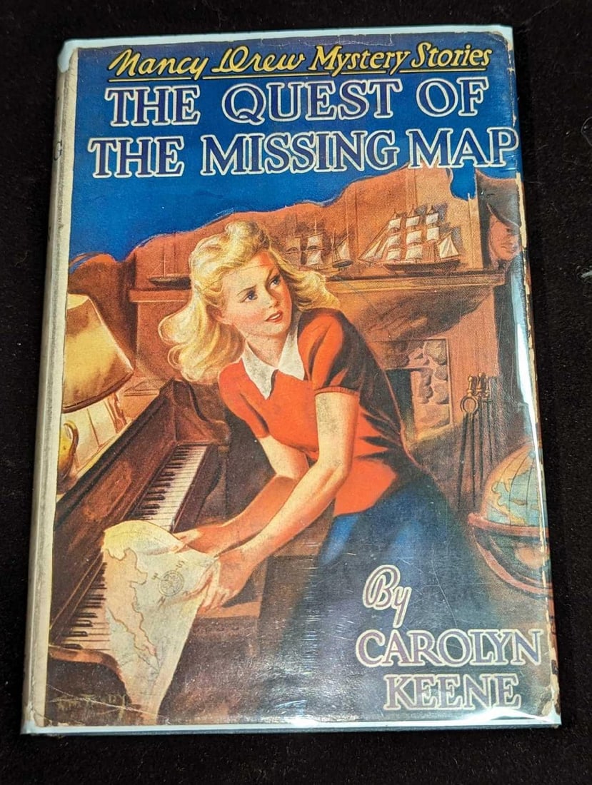 Nancy Drew #19 "The Quest Of The Missing Map" 1942 Dust Jacket First Edition: Nancy Drew #19 "The Quest Of The Missing Map" 1942 Dust Jacket First Edition. This is approx 5 3/8" x 1 1/4" x 7 3/4" and it weighs 0.73lb. The dust jacket has some shelf wear. Thi
