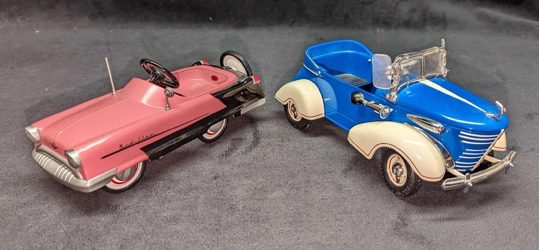 2 Hallmark Kiddie Car Classics 1956 Kidillac & Graham Roadster: 2 Hallmark Kiddie Car Classics 1956 Kidillac & Graham Roadster. This lot includes: (1) Hallmark Kiddie Car Classics "1956 Kidillac". This was released in 1994. This mini metal car is appro