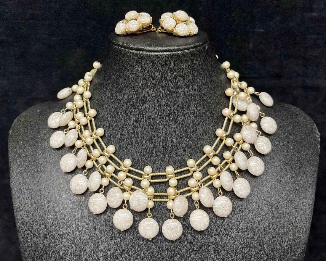 Vintage Kramer Gold Tone Necklace With Matching Clip On Earrings: This lot contains a Vintage Kramer Gold Tone Two Tiered Necklace With Matching Clip On Earrings. The necklace is approx 7 1/2" when clasped. Each earring is approx 1 1/4" x 1" x 3/4". The Necklace can