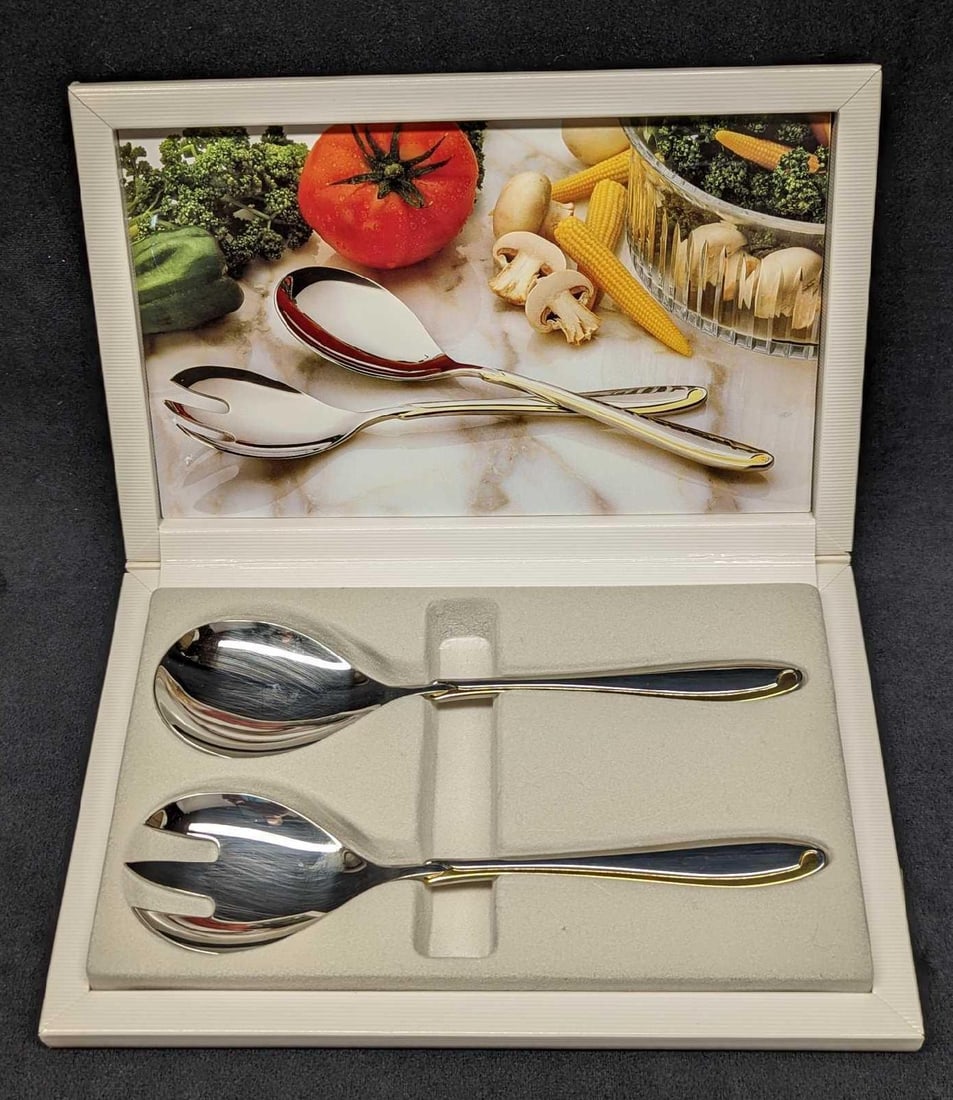 Retired Mikasa Estasi Stainless Salad Set: Retired Mikasa Estasi Stainless Salad Set. Stainless steel with a gold accent. Made in Japan. Both come in the original box which is approx 10" x 6 1/2" x 1 1/4" and it weighs 0.73lb. The fork and spo