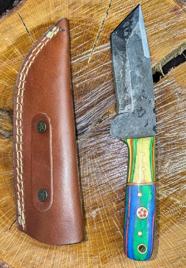 MHS Cutlery Steel Knife And Leather Sheath RTCLL: MHS Cutlery Steel Knife And Leather Sheath RTCLL. Steel knife comes in a leather sheath. Is approx 2 1/4" x 3/4" x 8 3/4" and it weighs 0.41b. The knife does not appear to have been used and has a coa