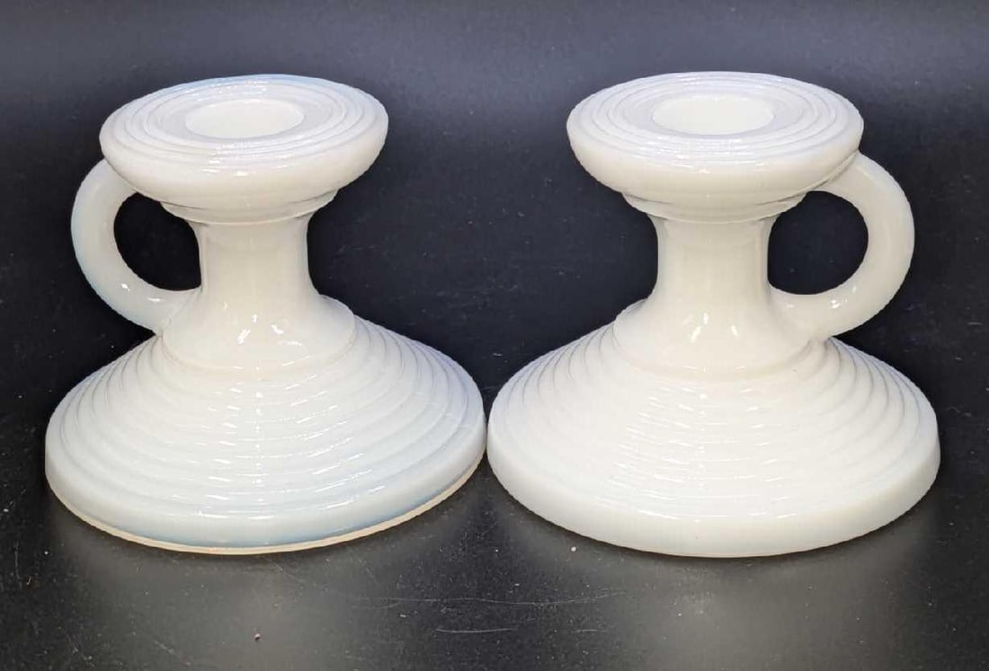 2 Vintage White Milk Glass Candle Holders: 2 Vintage White Milk Glass Candle Holders. Each is approx 3 1/4" x 3 1/4" x 2 5/8" and the total weight is 0.65lb. The candle holders are in good, vintage condition with no chips or cracks.