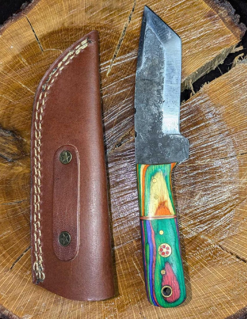 MHS Cutlery Steel Knife And Leather Sheath RTCMM: MHS Cutlery Steel Knife And Leather Sheath RTCMM. Steel knife comes in a leather sheath. Is approx 2 1/4" x 3/4" x 8 7/8" and it weighs 0.43b. The knife does not appear to have been used and has a coa