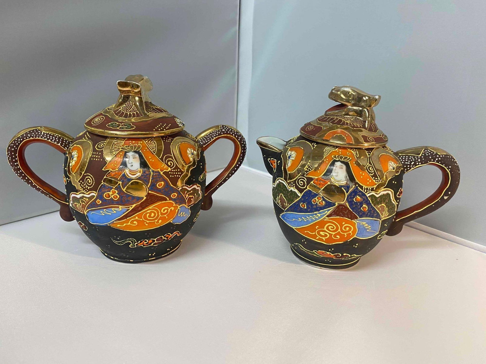 Vintage Japan Hand Painted Enamel Moriage Porcelain Sugar Bowl & Creamer: Vintage Japan Hand Painted Enamel Moriage Porcelain Sugar Bowl & Creamer 1 Creamer 5.5" 1 Sugar Bowl 5.5" 1.5 lbs No Cracks Or Cra