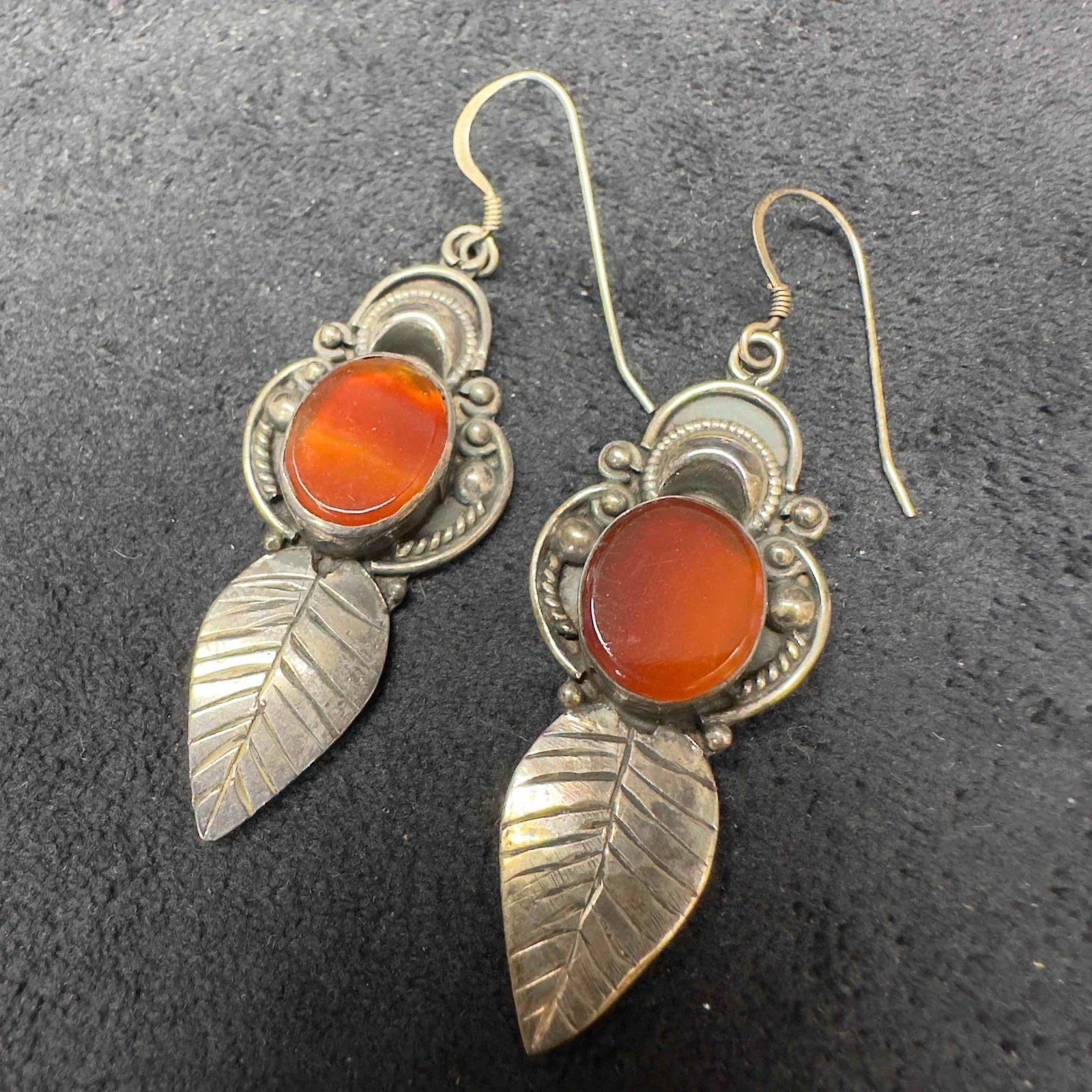 Ornate Artisan Leaf Motif Carnelian Sterling Earrings B42: This item is in good pre-owned, previously used/displayed condition with noticeable light wear, and surface scratches. Please reference all photos for full details. This piece of jewelry has been test