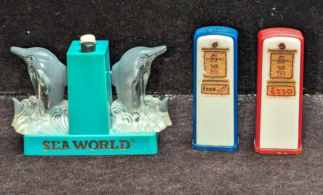 Vintage Esso Gas Tank & Sea World Dolphin Salt & Pepper Shakers: Vintage Esso Gas Tank & Sea World Dolphin Salt & Pepper Shakers. This lot includes: (1) Sea World Plastic Dolphin Salt & Pepper Shaker. This is approx 3 1/2" x 1 1/2" x 2 3/4"
