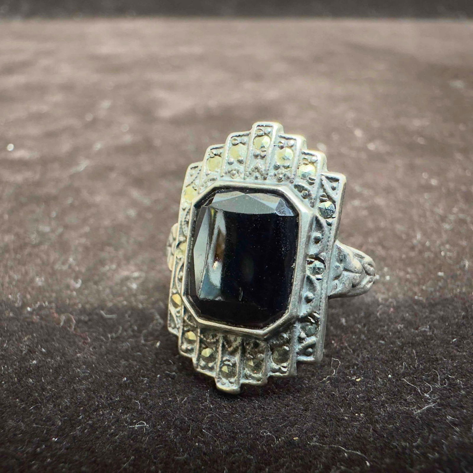 Marcasite and Black Onyx Sterling Silver Size 4 Ring: This item is in good pre-owned, previously used/displayed condition with noticeable light wear, and surface scratches. Please reference all photos for full details. This piece of jewelry has been test