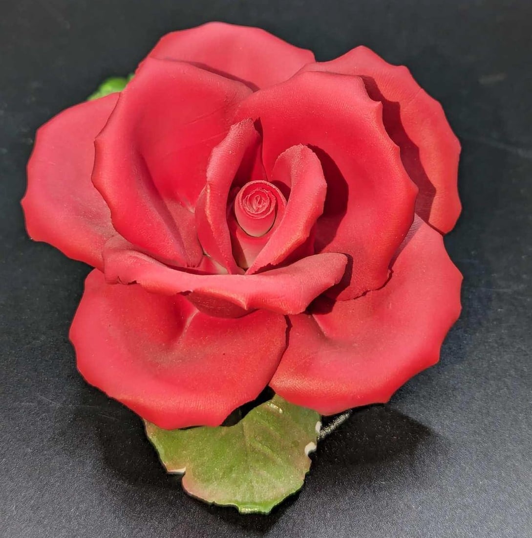 Vintage Italy Capodimonte American Beauty Figure: Vintage Italy Capodimonte American Beauty Figure. This is approx 6 3/4" x 3" x 2 1/2" and it weighs 0.44lb. There is a chip on the back of the stem and a chip on the back and front of the petals. Plea