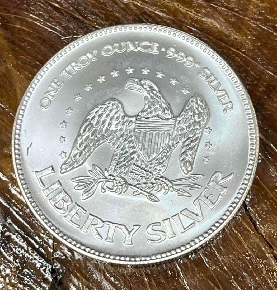 .999 Fine Silver A-Mark Liberty 1oz Bullion Round (B): This Round has been tested and researched to the best of our ability prior to listing. Please view photos, as they are a part of the condition. DETAILS: Metal - .999 Fine Silver Tested - Yes Size - 38