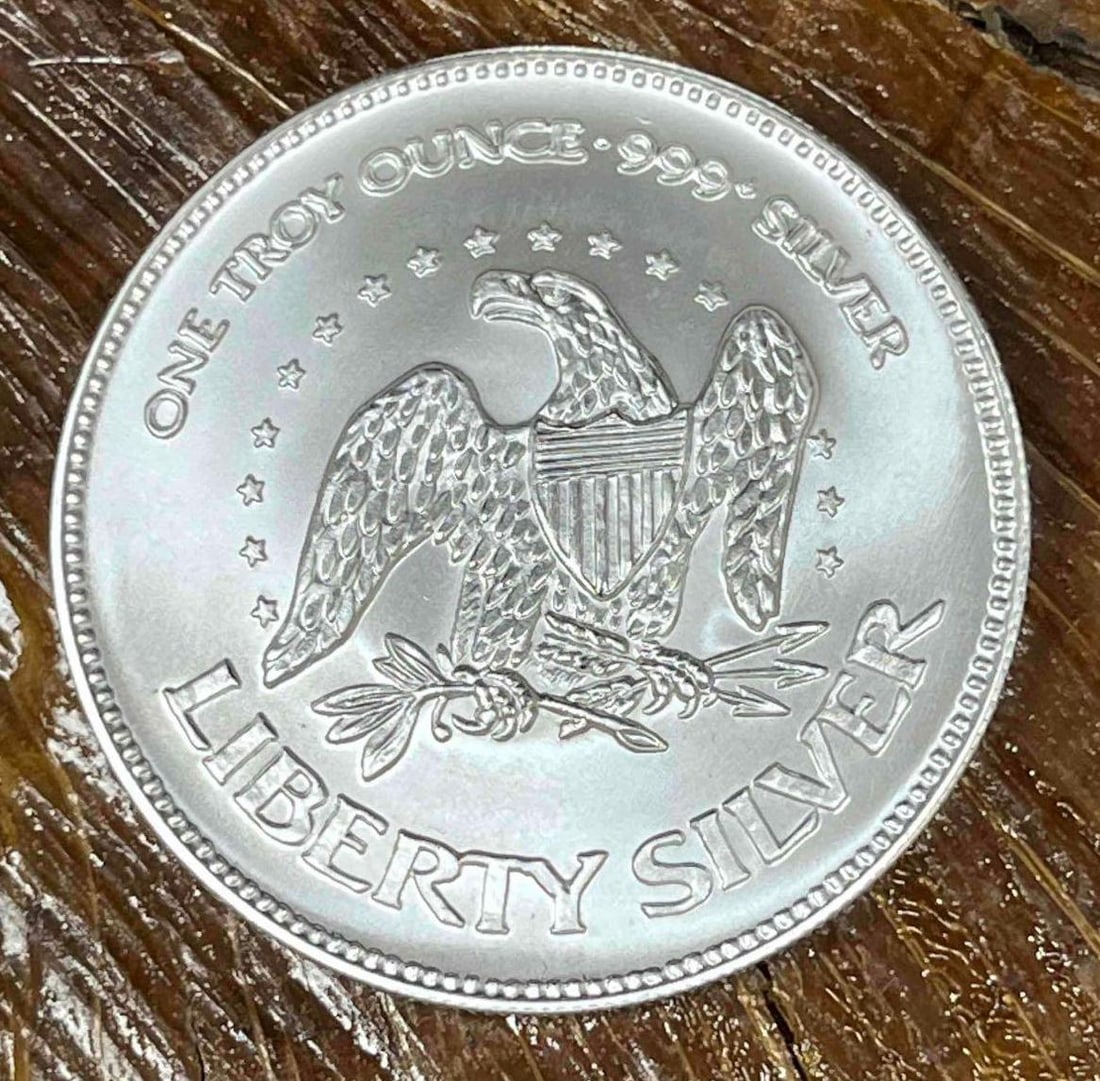 .999 Fine Silver A-Mark Liberty 1oz Bullion Round (J): This Round has been tested and researched to the best of our ability prior to listing. Please view photos, as they are a part of the condition. DETAILS: Metal - .999 Fine Silver Tested - Yes Size - 38