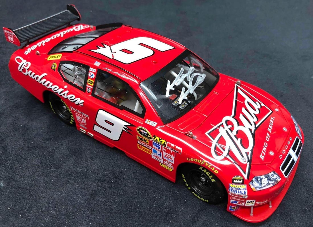 Autographed #9 Kasey Kahne 2009 Budweiser Dodge Charger 1:24 Replica: This lot contains Action Racing Collectables1:24 Scale Stock Car - #9 Kasey Kahne Budweiser 2009 Dodge Charger with SIGNED autograph and original box. It is approx 10" x 3-1/2" x 4-3/4" an