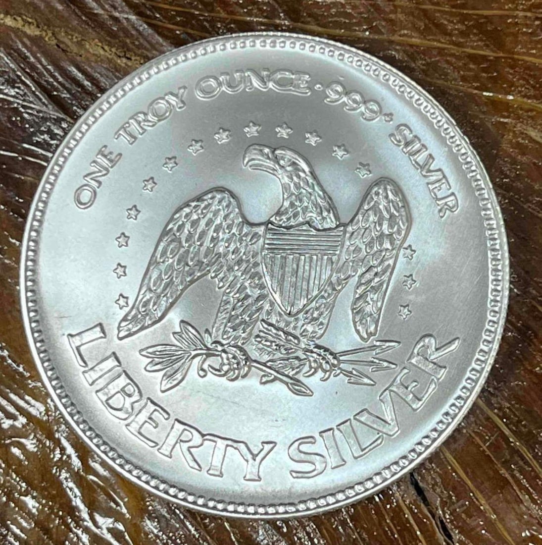 .999 Fine Silver A-Mark Liberty 1oz Bullion Round (H): This Round has been tested and researched to the best of our ability prior to listing. Please view photos, as they are a part of the condition. DETAILS: Metal - .999 Fine Silver Tested - Yes Size - 38