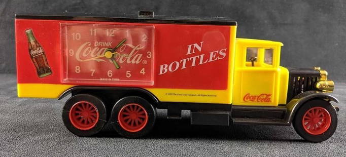 Coca-Cola Analog Musical Alarm Clock: Coca-Cola Analog Musical Alarm Clock. It comes in its original box which is approx 11 1/2" x 3 1/2" x 4 1/2" and it weighs 1.23lb. The box has some shelf wear the clock is untested.
