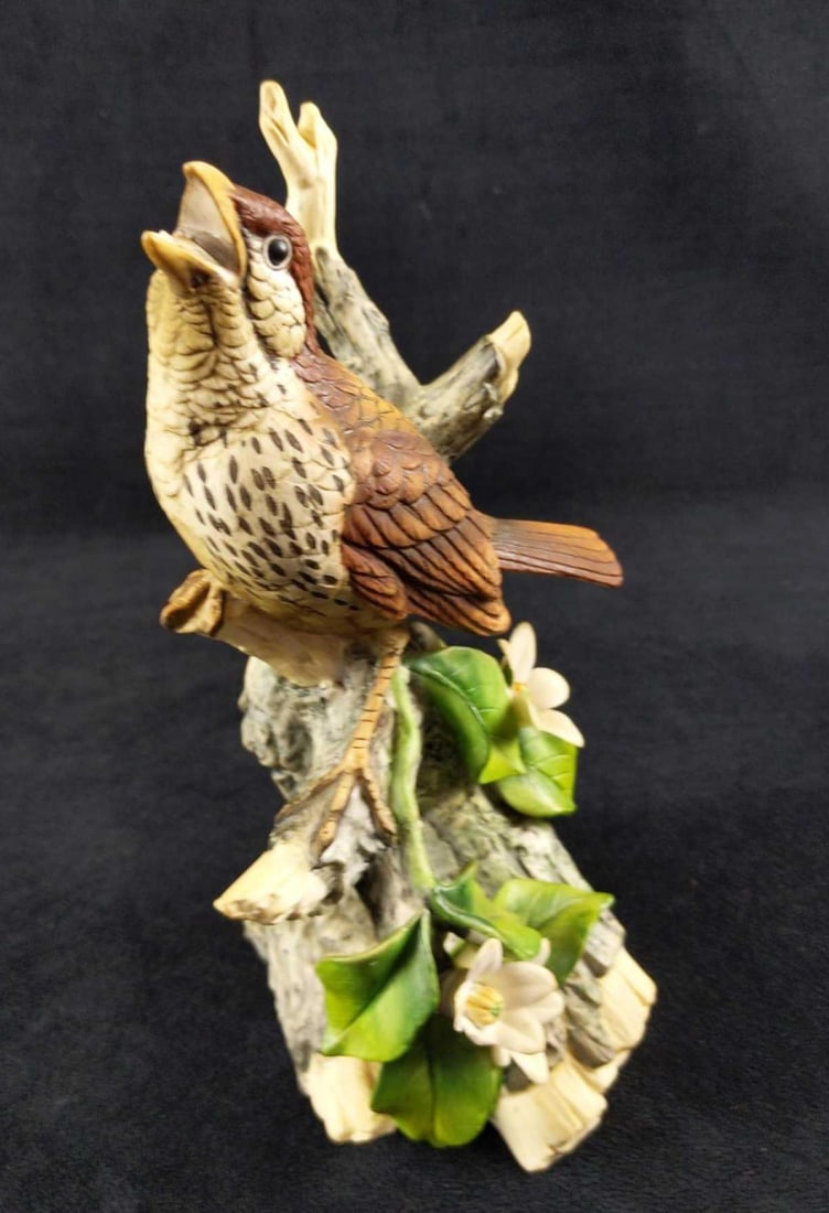 Vintage Andrea By Sadek Wood Thrush Bird Figurine: Hand-painted porcelain wood thrush bird sits upon some branches and sends out his daily tweets. From Andrea By Sadek. Is approx 5" x 4" x 9 1/2". The bird figurine is in good, used condition with