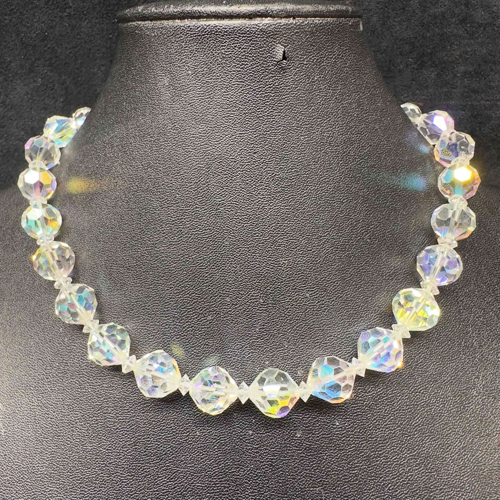 Vendome Clear Crystal Iridescent Beaded Rhinestone Bead Clasp Accent Necklace H59: Vendome Clear Crystal Iridescent Beaded Rhinestone Bead Clasp Accent Necklace H59. Necklace with clear glass beads with beautiful designs. The necklace features a open box clasp closure with a rhinest