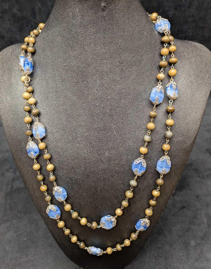 Vintage Double Stand Blue Glass Necklace: Vintage Double Stand Blue Glass Necklace. Has no company or artist markings. Glass is similar to Czech glass. Is 57" and it weighs 0.26lb. 