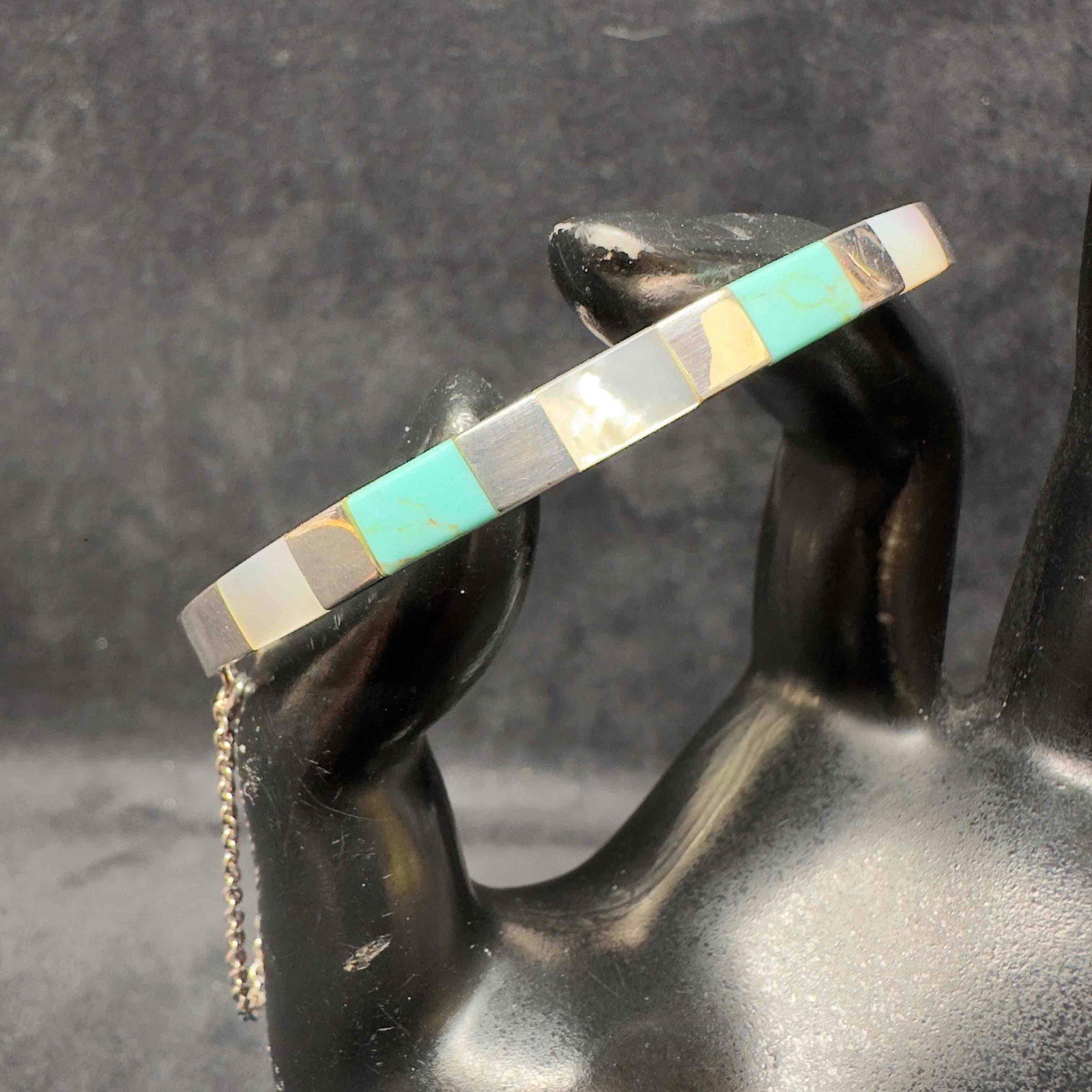 Mother of Pearl and Turquoise Inlay Sterling Silver Cuff Safety Chain Bracelet: This item is in good pre-owned, previously used/displayed condition with noticeable light wear, and surface scratches. Please reference all photos for full details. This piece of jewelry has been test