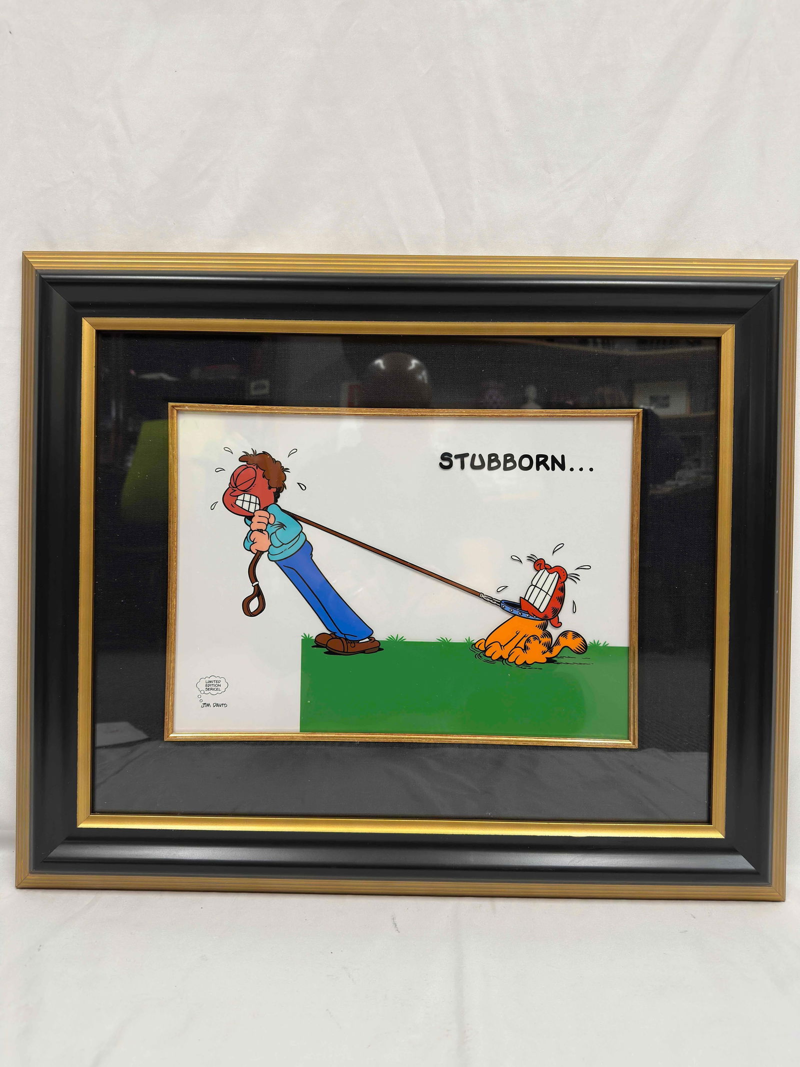 Jim Davis Garfield Stubborn Limited Edition Sericel Framed 1993: Jim Davis Garfield Stubborn Limited Edition Sericel Framed 1993. Sericel. From the limited edition of 9500. Includes original Park West Certificate of Authenticity and Appraisal paperwork. This item i