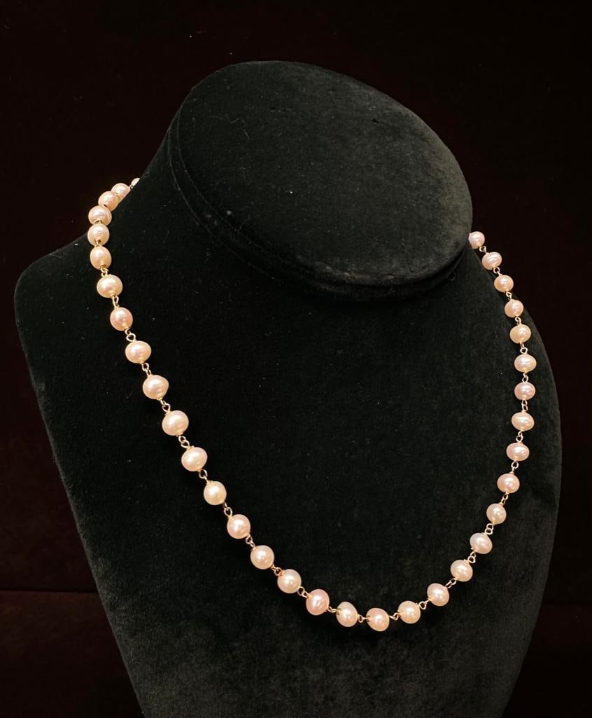 14k Gold and Freshwater Pearl Necklace: This piece of jewelry has been tested and researched prior to listing. Please view all our pictures they are part of our description. DETAILS: Metal - 14k Gold Color - Yellow Gold Stones - Freshwater