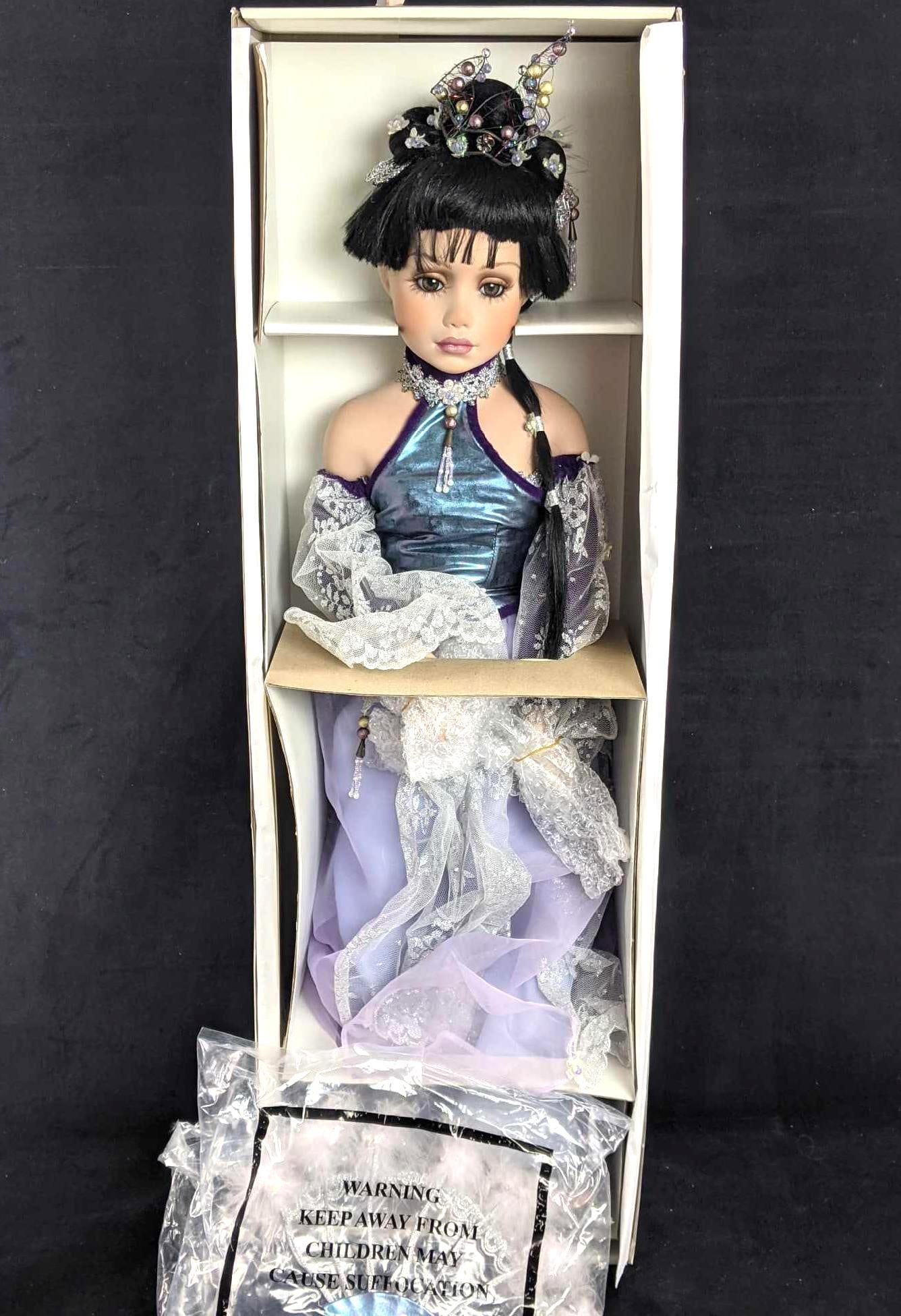 Porcelain Papa Tung Doll Around The World Collection (1 of 10)
