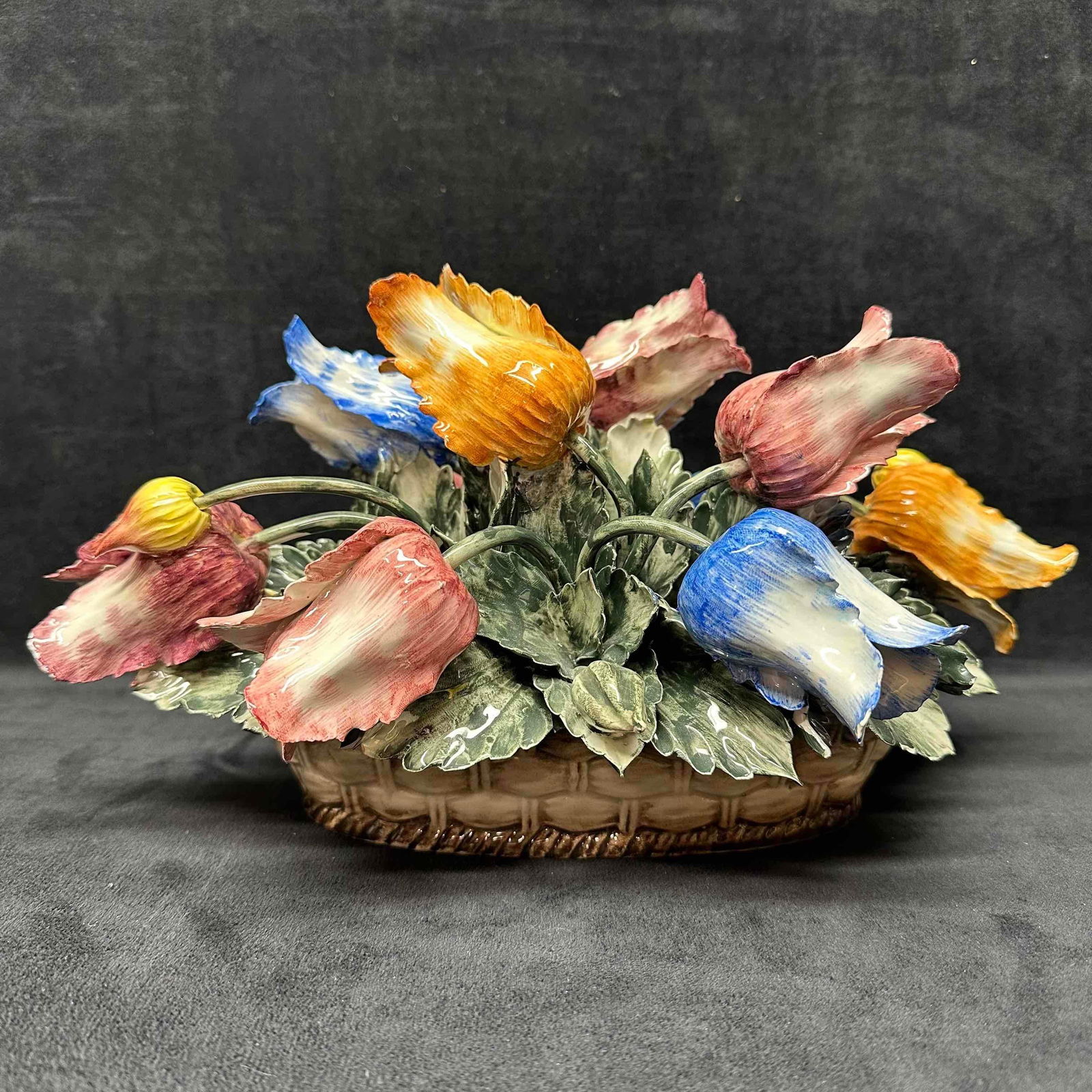 Capodimonte Porcelain Centerpiece Flower Basket of Tulips Display R153: Capodimonte Porcelain Centerpiece Flower Basket of Tulips Display R153. A few noticeable light chips in the porcelain on a few of the flower tips. Minor markings and wear on the bottom. This item is i