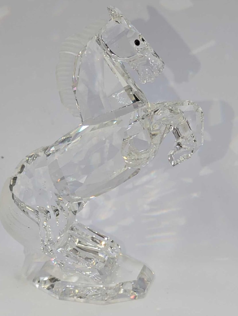 Swarovski Crystal Rearing Stallion Horse With Box A: Swarovski Crystal Rearing Stallion Horse With Box A. The stallion is approx 3 3/8" x 1 1/4" x 4 1/8". It comes in the original box which is approx 6 1/4" x 6 1/4" x 4 7/8" and it weighs 0.91lb. The fi