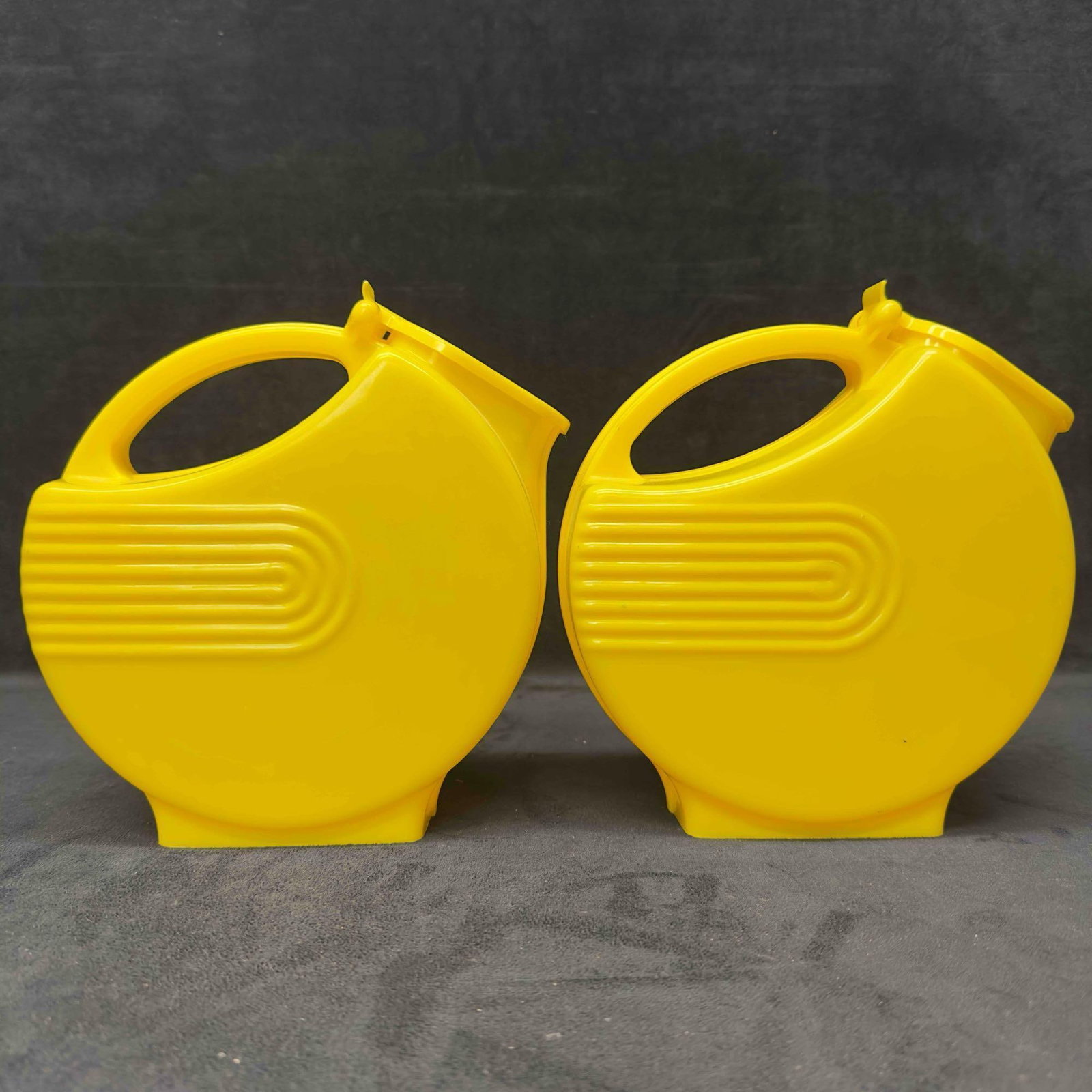 Burrite Yellow Plastic 1.5qt Watering Can Art Deco Water Pitcher Set: Burrite Yellow Plastic 1.5qt Watering Can Art Deco Water Pitcher Set. These items are in pre-owned, previously displayed condition with light wear, and surface scratches. Please reference all photos f