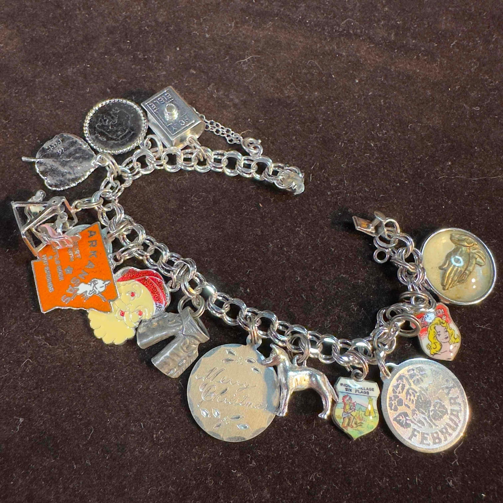 Elco Sterling Fourteen Charms Silver Charm Bracelet: This item is in good pre-owned, previously used/displayed condition with noticeable light wear, and surface scratches. Please reference all photos for full details. This piece of jewelry has been test
