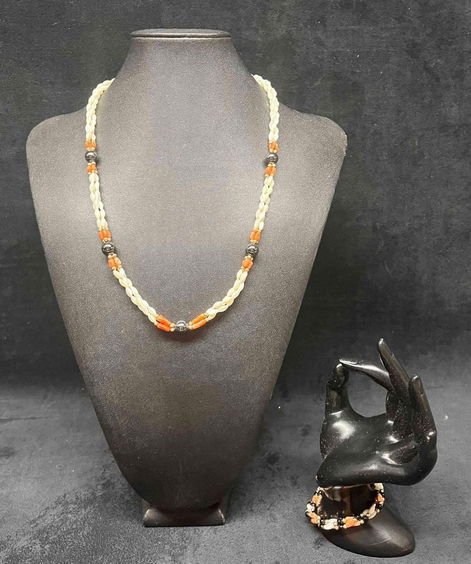 Gold Plated Matching Necklace & Bracelet Made In Japan: This lot contains a Gold Plated Matching Necklace & Bracelet Made In Japan. Please note: Under the studio lighting the beads appear to be an orange shade however in reality they are a salmon color. Pl